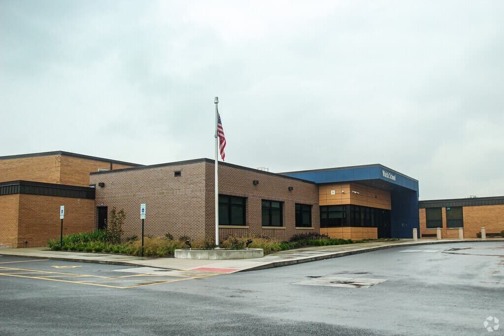 Cafeteria Flooring & Door Replacement at Walsh School